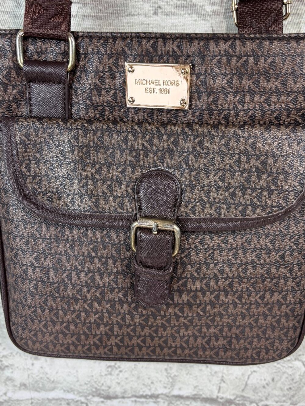 Michael Kors Signature Everett flight bag with central buckle strap